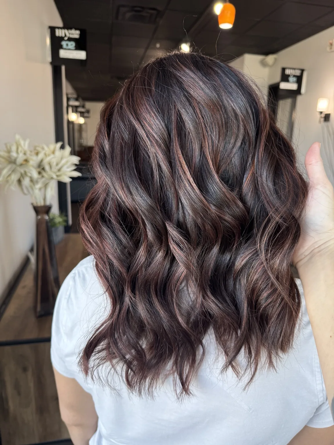 Dimensional brunette hair color by Drea in Draper Utah
