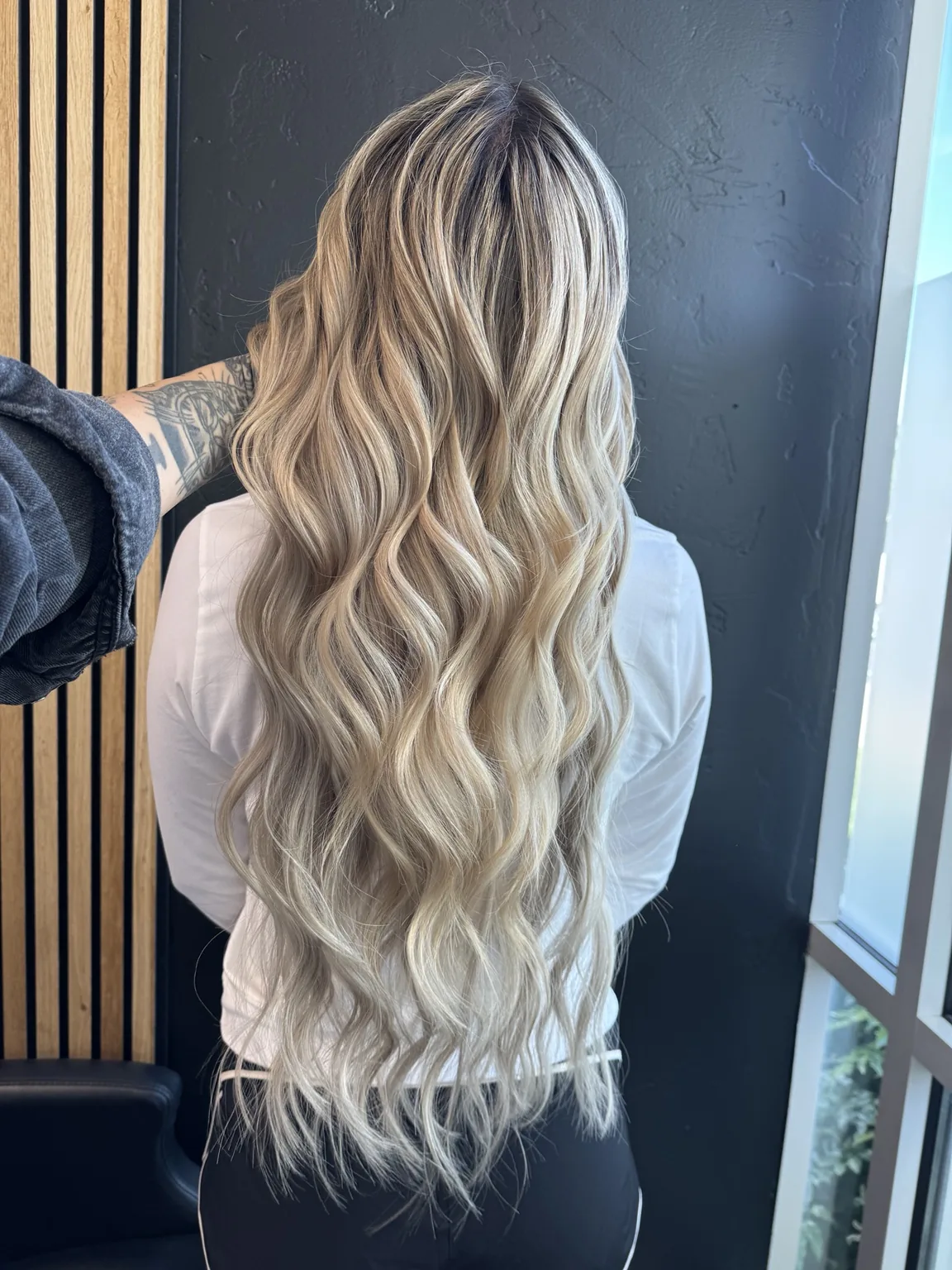 Long blonde extension blend at Method Hair Collective